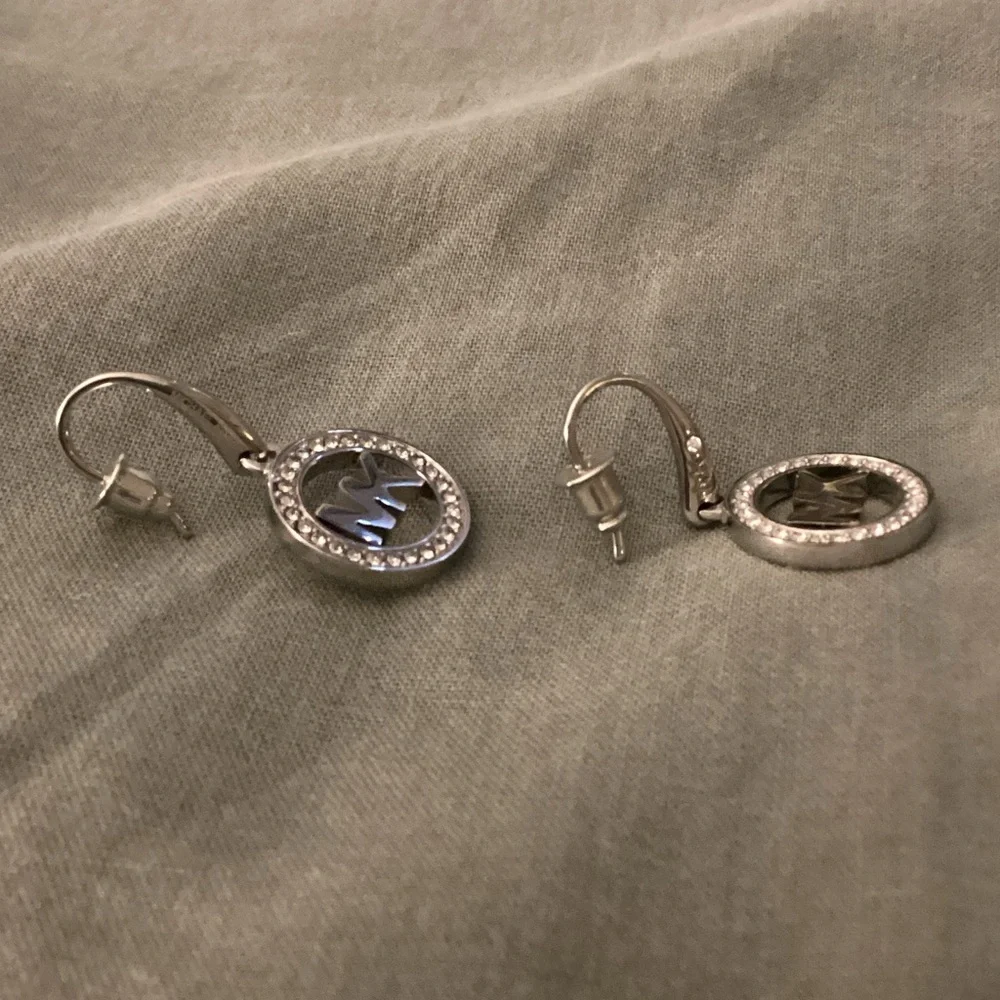 Michael Kors Silver Logo Circle Dangle Earrings - Picture 3 of 5